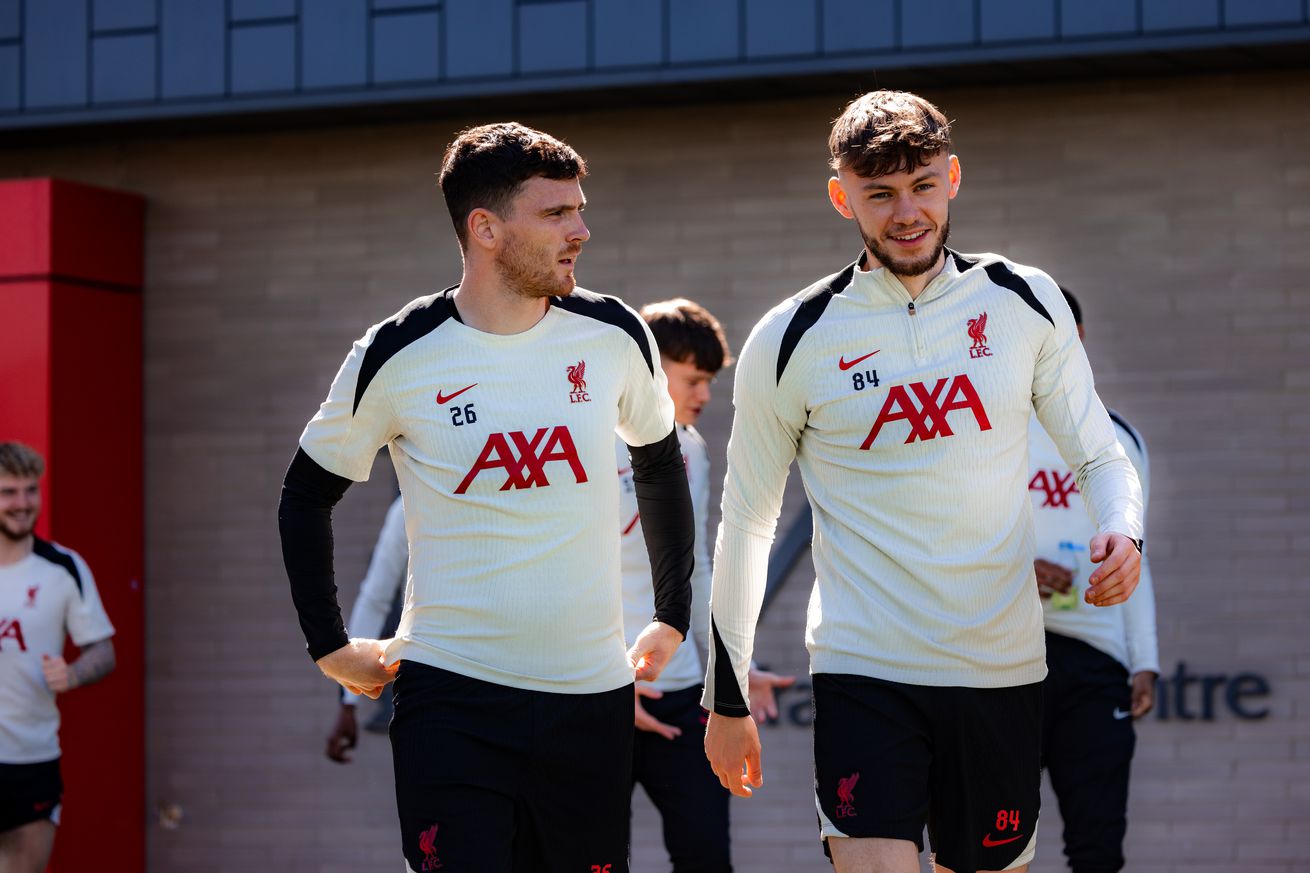 Andy Robertson and Conor Bradley of Liverpool during a training session at AXA Training Centre on April 09, 2025 in Kirkby, England.