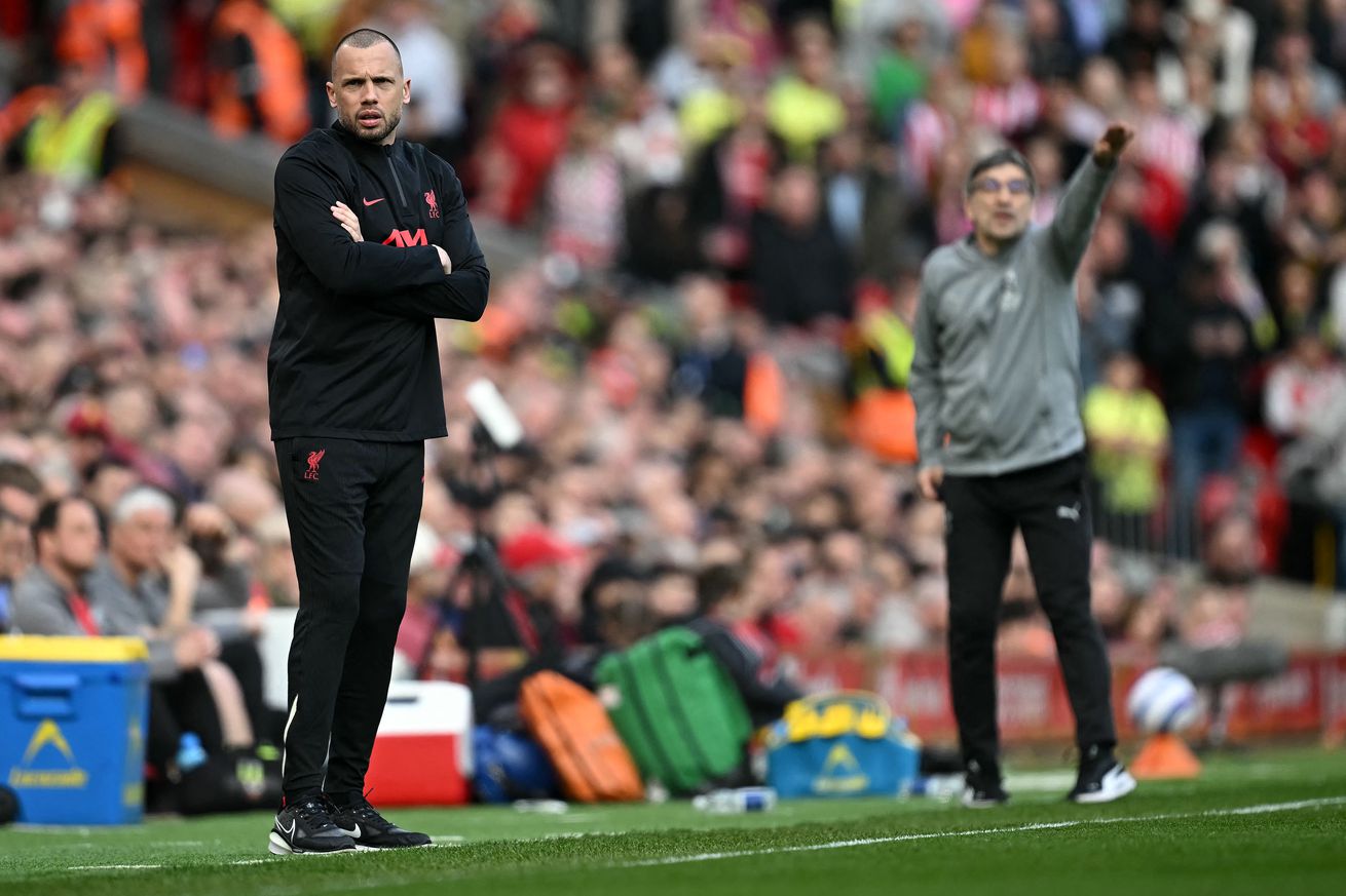 John Heitinga on the sidelines for Liverpool as the Reds play Southampton in the Premier League.