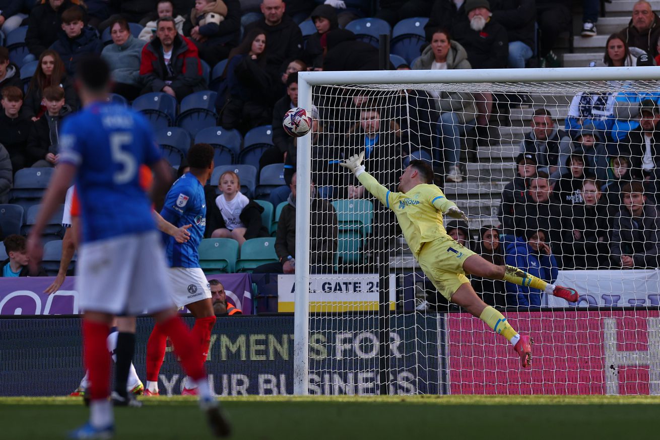 Freddie Woodman of Preston North End makes a save during the Sky Bet Championship match between Preston North End FC and Portsmouth FC at Deepdale on March 15, 2025 in Preston, England.